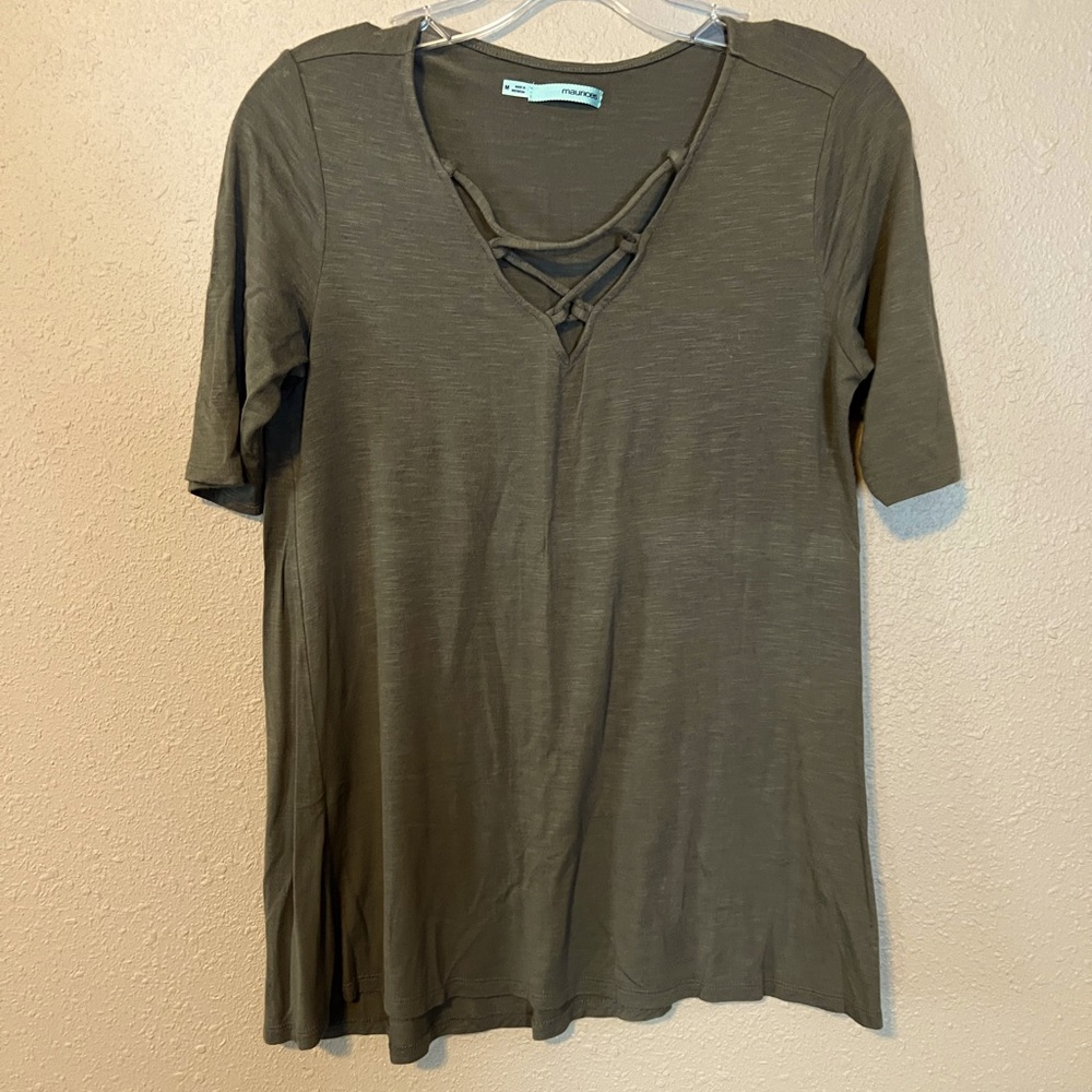 Short sleeve v neck shirt with cross cross design along neckline
